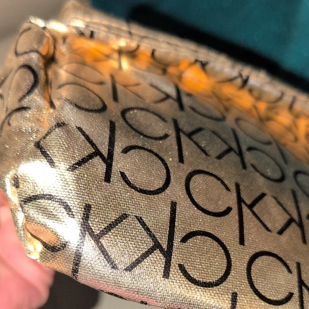 Calvin Klein Metallic Gold Backpack with Black Logo